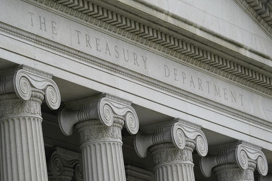 The Treasury Building is viewed in Washington, May 4, 2021. The Treasury Department has imposed sanctions on 13 members of Mexico’s powerful Sinaloa cartel and four Sonora, Mexico-based firms accused of trafficking fentanyl and other drugs into the United States, on Tuesday. Included in the sanctions are Juan Carlos Morgan Huerta, who allegedly manages cartel operations in Nogales and oversees the trafficking of multi-ton quantities of drugs, as well as members of his family, and his associates. (AP Photo/Patrick Semansky, File)