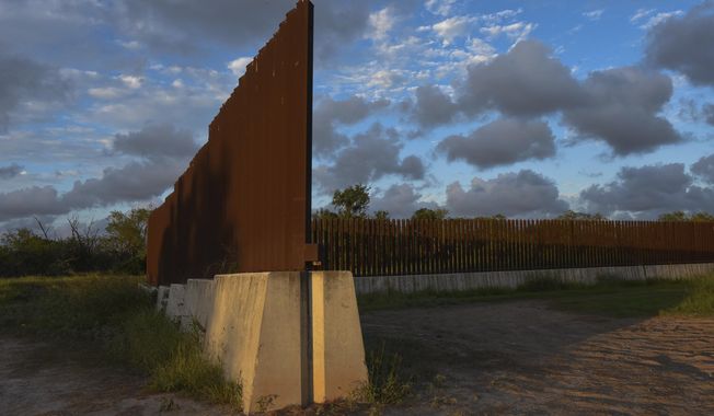 Dusk begins to fall at a section of border fence in Brownsville, Texas, on Wednesday, Nov. 8, 2023. The Biden administration&#x27;s plan to build new barriers along the U.S.-Mexico border calls for a &quot;movable&quot; design that frustrates both environmentalists and advocates of stronger border enforcement. (AP Photo/Valerie Gonzalez)