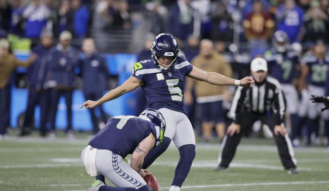 Seattle Seahawks place kicker Jason Myers (5) kicks a field goal in the second half of an NFL football game against the Washington Commanders in Seattle, Sunday, Nov. 12, 2023. (AP Photo/John Froschauer) **FILE**