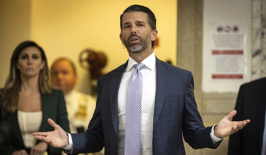 Donald Trump, Jr. speaks to the media outside the courtroom at New York Supreme Court, Monday, Nov. 13, 2023, in New York. Trump Jr. returned to the stand in the court today as defense lawyers start calling witnesses in the civil fraud trial that threatens his father’s real estate empire. (AP Photo/Stefan Jeremiah)