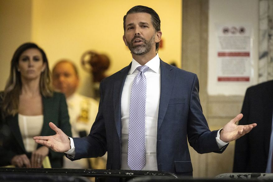 Donald Trump, Jr. speaks to the media outside the courtroom at New York Supreme Court, Monday, Nov. 13, 2023, in New York. Trump Jr. returned to the stand in the court today as defense lawyers start calling witnesses in the civil fraud trial that threatens his father’s real estate empire. (AP Photo/Stefan Jeremiah)