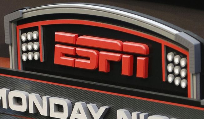 The ESPN logo is seen, Sept. 16, 2013, prior to an NFL football game between the Cincinnati Bengals and the Pittsburgh Steelers in Cincinnati. ESPN Bet, a rebranded sports-gambling app owned by Penn Entertainment, is set to launch Tuesday, Nov. 14, 2023. (AP Photo/David Kohl, File)
