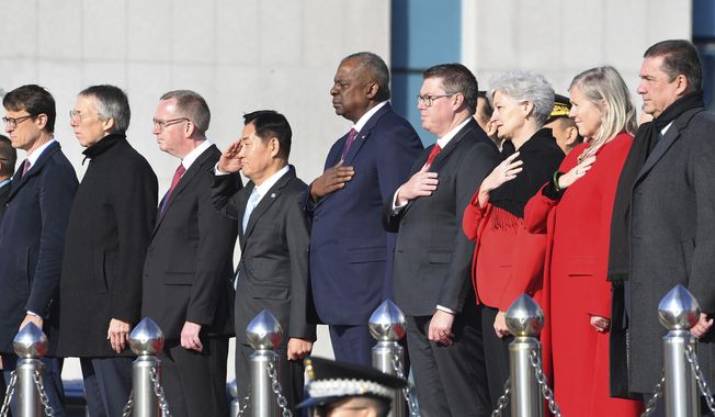 U.S. Secretary of Defense Lloyd Austin, center, and South Korean Defense Minister Shin Won-sik, fourth from left, attend a welcome ceremony before their Defense Minister meeting of the South Korea-United Nations Command (UNC) Member nations at the Defense Ministry in Seoul, South Korea, on Tuesday, Nov. 14, 2023. (Song Kyung-Seok/Kyodo News via AP, Pool)