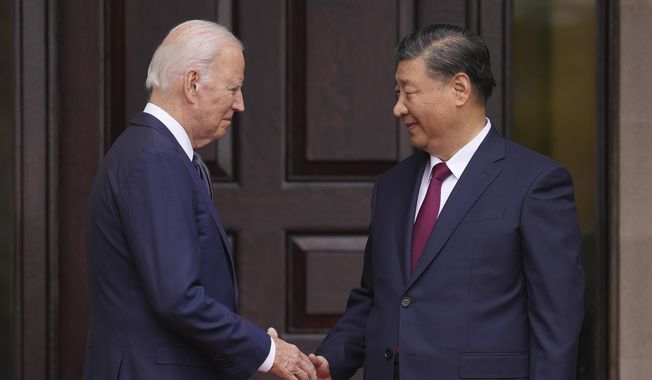 President Joe Biden greets China&#x27;s President President Xi Jinping at the Filoli Estate in Woodside, Calif., Wednesday, Nov, 15, 2023, on the sidelines of the Asia-Pacific Economic Cooperative conference. (Doug Mills/The New York Times via AP, Pool)