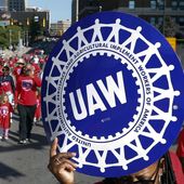 United Auto Workers members walk in the Labor Day parade in Detroit, Sept. 2, 2019. More than 1,500 employees at Mercedes-Benz&#x27;s Tuscaloosa, Alabama, plant have signed union cards with the United Auto Workers, the largest step yet in the union&#x27;s effort to organize nonunion auto shops. (AP Photo/Paul Sancya, File)