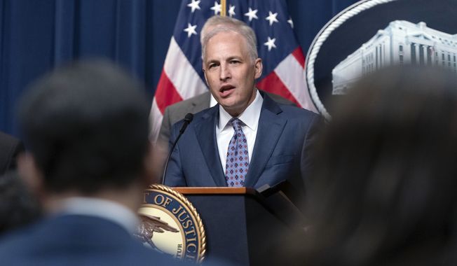 Assistant Attorney General Matthew Olsen of the Justice Department&#x27;s National Security Division speaks during a news conference at the Department of Justice in Washington, May 16, 2023. The Biden administration is running out of time to win the reauthorization of a spy program it says is vital to preventing terrorism, catching spies and disrupting cyberattacks. The tool is called Section 702 of the Foreign Intelligence Surveillance Act. (AP Photo/Jose Luis Magana, File)