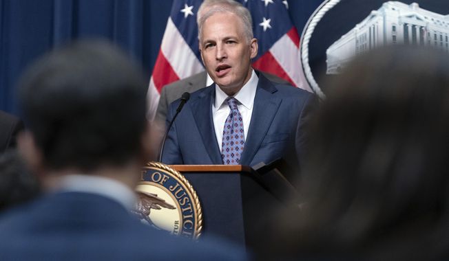 Assistant Attorney General Matthew Olsen of the Justice Department&#x27;s National Security Division speaks during a news conference at the Department of Justice in Washington, May 16, 2023. With just seven weeks until the end of the year, the Biden administration is running out of time to win the reauthorization of a spy program it says is vital to preventing terrorism, catching spies and disrupting cyberattacks. The tool is called Section 702 of the Foreign Intelligence Surveillance Act. (AP Photo/Jose Luis Magana, File)