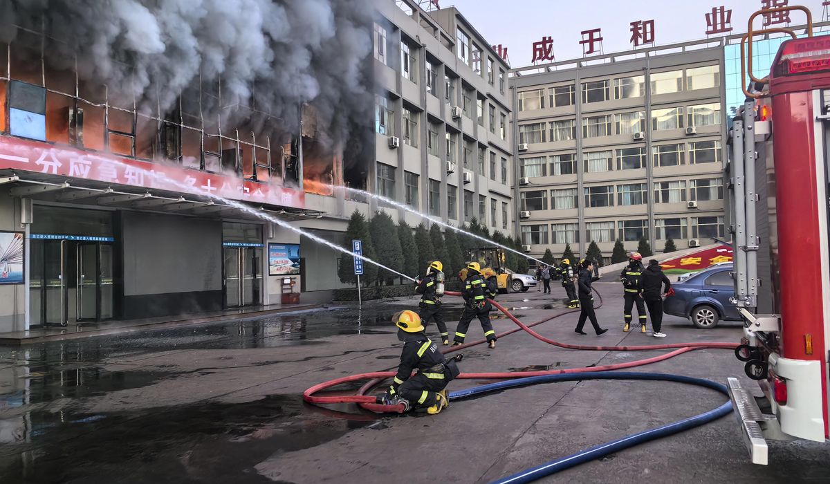 NextImg:Fire at a coal mining company building in northern China kills 26 and injures dozens