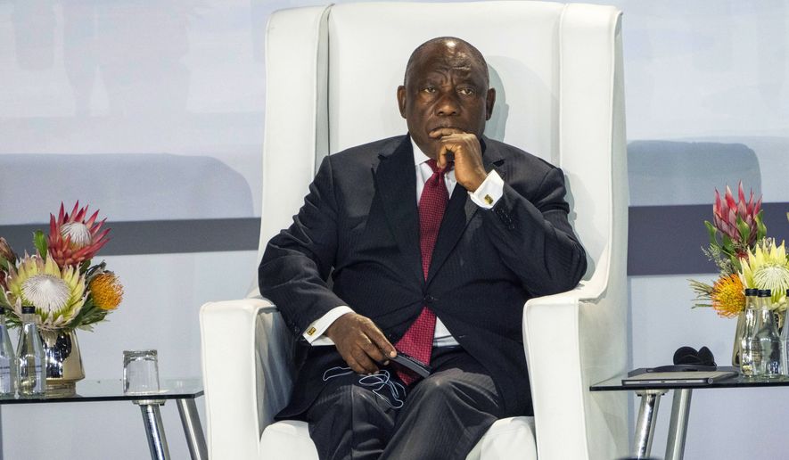 South African President Cyril Ramaphosa listens during the BRICS group of emerging economies three-day summit in Johannesburg, South Africa, Tuesday, Aug. 22, 2023. Ramaphosa says his country has filed a referral to the International Criminal Court for an investigation into alleged war crimes committed by Israel in Gaza. The move comes as South African lawmakers on Thursday, Nov. 16, 2023, were expected to debate a motion calling for the closure of the Israeli Embassy in South Africa and the cutting of all diplomatic ties with the country until it agrees to a cease-fire. (AP Photo/Jerome Delay, File)