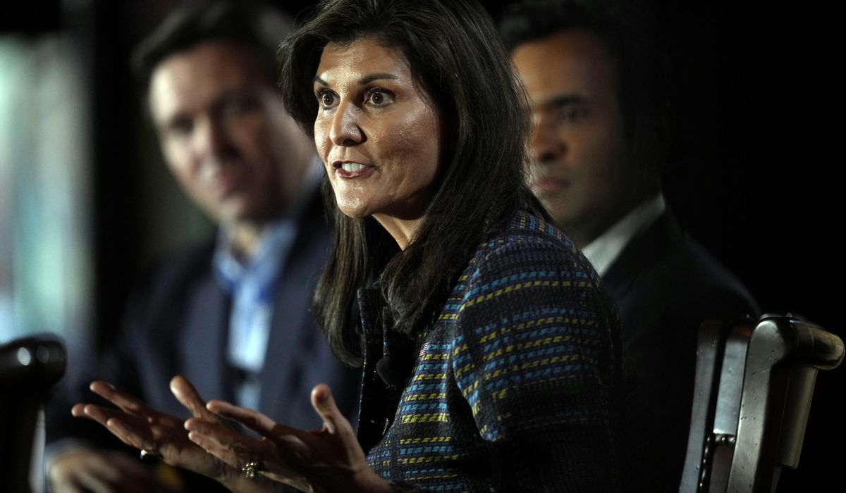 NextImg:Haley leads Biden, but loses badly to Trump, new poll shows
