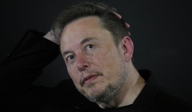 Elon Musk reacts during an in-conversation event with Britain&#x27;s Prime Minister Rishi Sunak in London, Thursday, Nov. 2, 2023.  IBM has stopped advertising on social media platform X after a report said its ads were appearing alongside material praising Adolf Hitler and Nazis 鈥� a fresh setback as the site formerly known as Twitter tries to win back big brands and their ad dollars.(AP Photo/Kirsty Wigglesworth, Pool) **FILE**