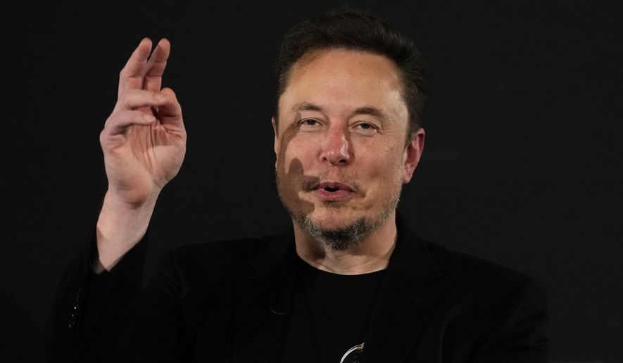 Elon Musk, owner of social media platform X, gestures during an event with Britain&#x27;s Prime Minister Rishi Sunak in London on Nov. 2, 2023. IBM has stopped advertising on X after a report said its ads were appearing alongside material praising Adolf Hitler and Nazis. (AP Photo/Kirsty Wigglesworth, Pool, File)