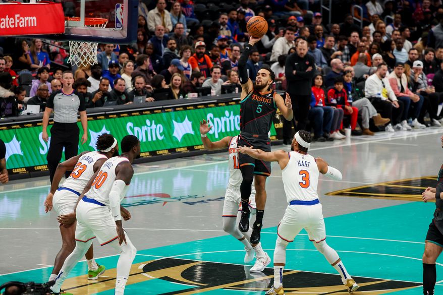 Point guard Tyus Jones (5) wizzing past the New York defense. The Washington Wizards lost to the New York Knicks 99 - 120 at Capital One Arena in Washington D.C. on Friday, November 17, 2023. (Photo: Taylor McLaughlin / All-Pro Reels)