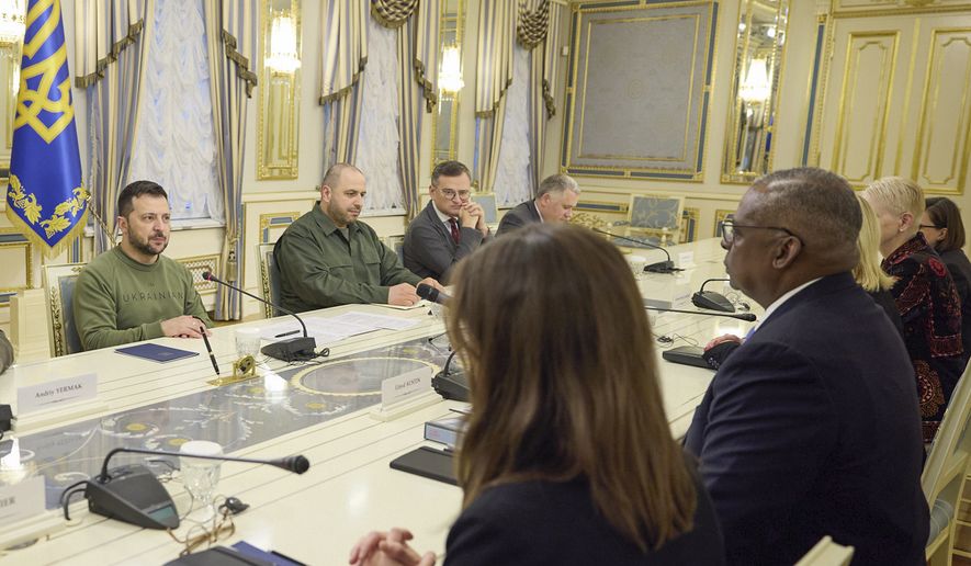 In this photo provided by the Ukrainian Presidential Press Office, Ukrainian President Volodymyr Zelenskyy, left, and U.S. Secretary of Defense Lloyd Austin talk during their meeting in Kyiv, Ukraine, Monday, Nov. 20, 2023. (Ukrainian Presidential Press Office via AP)