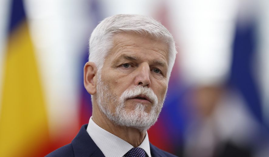 Czech Republic's President Petr Pavel delivers a speech at the European Parliament, Wednesday, Oct. 4, 2023, in Strasbourg, eastern France. Czech President Petr Pavel said he decided to sign into law a package of dozens of measures proposed by the government and approved by Parliament designed to keep the ballooning budget deficit under control. (AP Photo/Jean-Francois Badias, File)