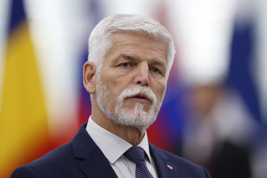 Czech Republic's President Petr Pavel delivers a speech at the European Parliament, Wednesday, Oct. 4, 2023, in Strasbourg, eastern France. Czech President Petr Pavel said he decided to sign into law a package of dozens of measures proposed by the government and approved by Parliament designed to keep the ballooning budget deficit under control. (AP Photo/Jean-Francois Badias, File)