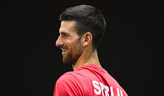 Serbia&#x27;s Novak Djokovic reacts as he practices during a training session of the Davis Cup in Malaga, Spain, Tuesday, Nov. 21, 2023. (AP Photo/Manu Fernandez) **FILE**