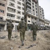 Israeli soldiers are seen during a ground operation in the Gaza Strip, Wednesday, Nov. 22, 2023. (AP Photo/Victor R. Caivano)