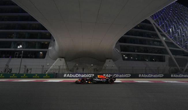 Red Bull driver Max Verstappen of the Netherlands steers his car during the second practice ahead of the Abu Dhabi Formula One Grand Prix at the Yas Marina Circuit, Abu Dhabi, UAE, Friday, Nov. 24, 2023. (AP Photo/Kamran Jebreili)