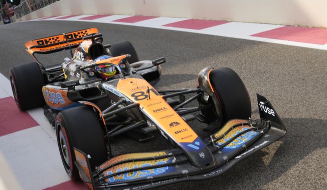 McLaren driver Oscar Piastri of Australia steers his car during the first practice ahead of the Abu Dhabi Formula One Grand Prix at the Yas Marina Circuit, Abu Dhabi, UAE, Friday, Nov. 24, 2023. (AP Photo/Kamran Jebreili)