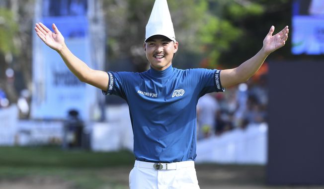 Australia&#x27;s Min Woo Lee reacts on the 17th hole during the final round of the Australian PGA Championship in Brisbane, Sunday, Nov. 26, 2023. (Jono Searle/AAP Image via AP)
