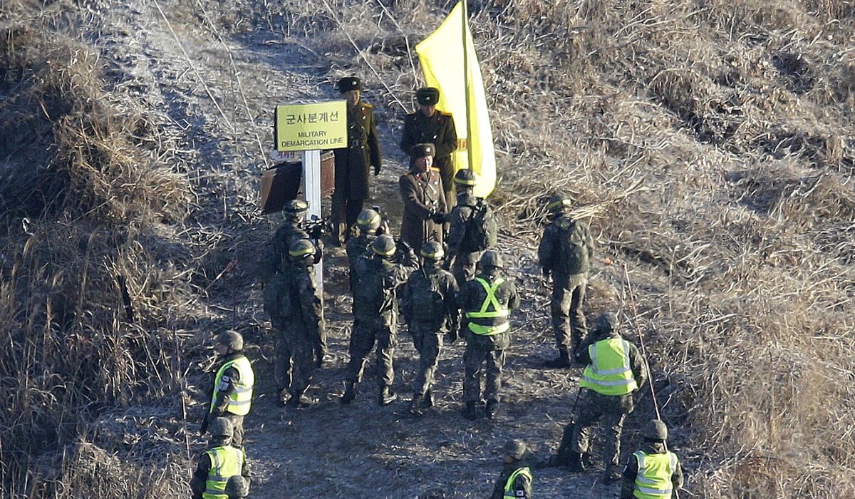 NextImg:North Korea restores border guard posts as tensions rise over its satellite launch, Seoul says
