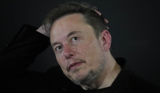 Elon Musk reacts during an in-conversation event with Britain&#x27;s Prime Minister Rishi Sunak in London, Thursday, Nov. 2, 2023. IBM has stopped advertising on social media platform X after a report said its ads were appearing alongside material praising Adolf Hitler and Nazis 鈥� a fresh setback as the site formerly known as Twitter tries to win back big brands and their ad dollars. (AP Photo/Kirsty Wigglesworth, Pool, File)