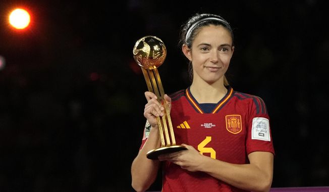 Spain&#x27;s Aitana Bonmati holds the Player of the Tournament trophy after the final of Women&#x27;s World Cup soccer between Spain and England at Stadium Australia in Sydney, Australia, Sunday, Aug. 20, 2023. Lionel Messi is the favorite to win a record-extending eighth Ballon d&#x27;Or on Monday, Oct. 30. Spain鈥檚 Aitana Bonmati is the favorite for the women鈥檚 award. (AP Photo/Rick Rycroft, File)