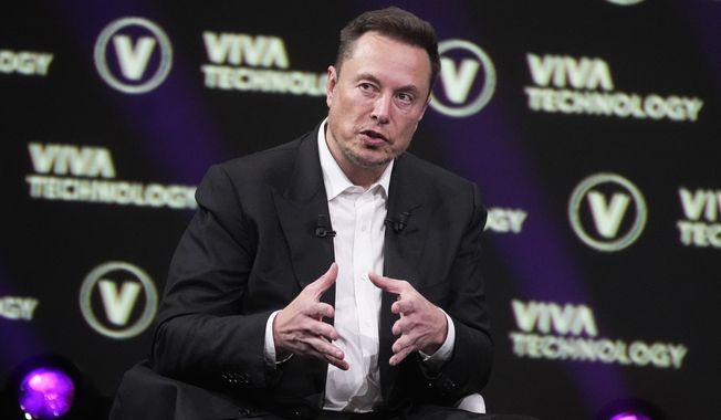Elon Musk, who owns X, formerly known as Twitter, Tesla and SpaceX, speaks at the Vivatech fair, June 16, 2023, in Paris. Musk said Wednesday, Nov. 29, that advertisers who have halted spending on his social media platform X in response to antisemitic and other hateful material are engaging in 鈥渂lackmail鈥� and, using a profanity, essentially told them to go away. (AP Photo/Michel Euler, File)