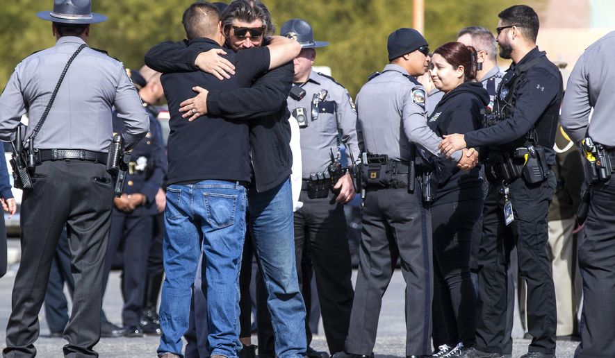 Two Nevada state troopers in Las Vegas who had stopped to help a driver on the state's busiest freeway were killed in the pre-dawn hours Thursday when an impaired driver struck them, authorities said. Photo: Associated Press