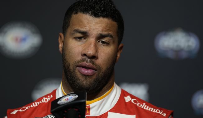 Bubba Wallace speaks during the NASCAR Daytona 500 auto racing media day Wednesday, Feb. 15, 2023, at Daytona International Speedway in Daytona Beach, Fla. Wallace acknowledged Thursday, Nov. 30, 2023, it was difficult for him to find joy in best friend Ryan Blaney鈥檚 first NASCAR championship.(AP Photo/Chris O&#x27;Meara, File) **FILE**