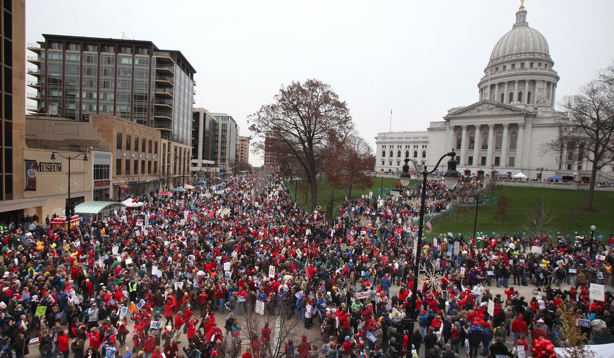NextImg:Collective bargaining ban in Wisconsin under attack by unions after Supreme Court majority flips