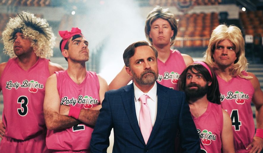 Daily Wire co-founder Jeremy Boreing, center, stars as Rob, a washed-up high school basketball coach who convinces a group of former men&#x27;s players to identify as women and dominate female sports in the 2023 comedy &quot;Lady Ballers.&quot; (Photo courtesy Daily Wire.)
