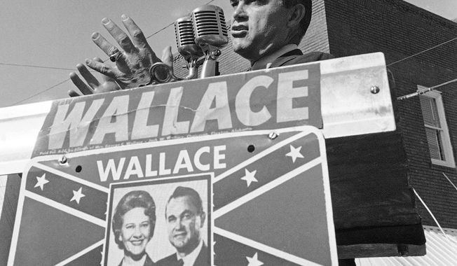 Alabama Gov. George C. Wallace gestures as he makes an election campaign speech for his wife, Lurleen, Nov. 8, 1966, in Wetumpka, Ala. Republican presidential candidates will debate Wednesday, Dec. 6, 2023, within walking distance of where Wallace staged his “stand in the schoolhouse door” to oppose the enrollment of Black students at the University of Alabama during the Civil Rights Movement. (AP Photo/LG, File)