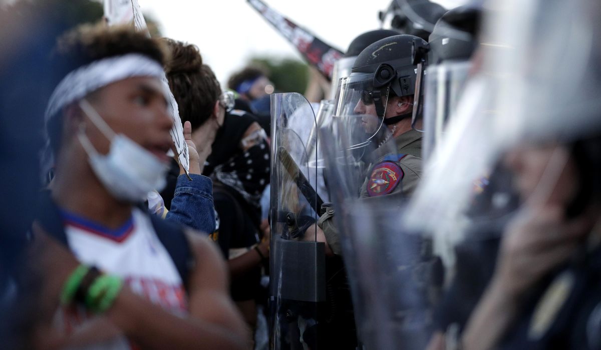NextImg:Texas prosecutor drops most charges against Austin police over tactics used during 2020 protests