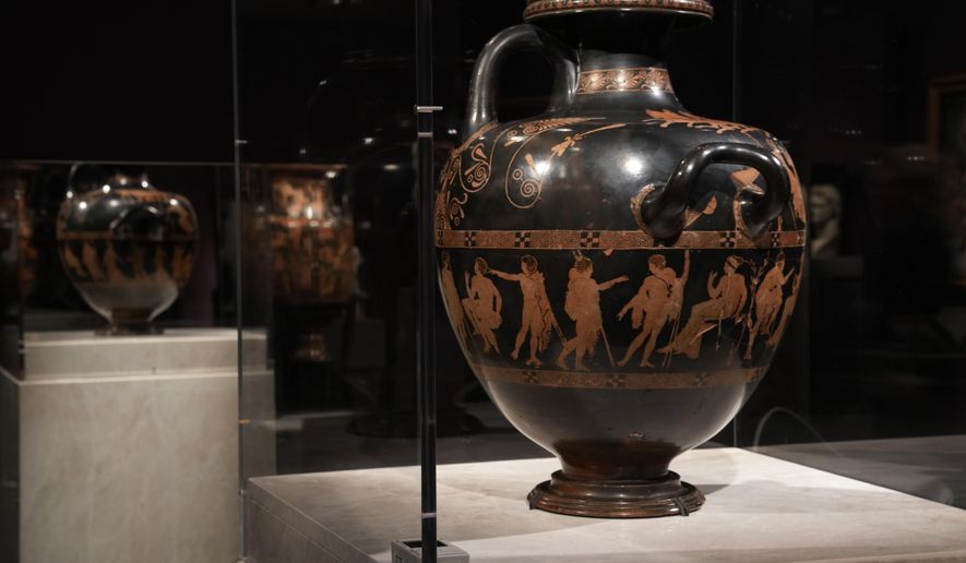 The ancient Greek vase from 420 BC – the Meidias Hydria – on loan from the British Museum, is on display during a media tour ahead of the Greece&#x27;s Acropolis Museum officially launched of the exhibition, &#x27;Meanings&#x27; Personifications and Allegories From Antiquity to Today, in Athens, Tuesday, Dec. 5, 2023. The loan coincides with a spat between the two countries over Greek demands for the return of sculptures from the Parthenon temple on the Acropolis that are housed in the British Museum. (AP Photo/Thanassis Stavrakis)