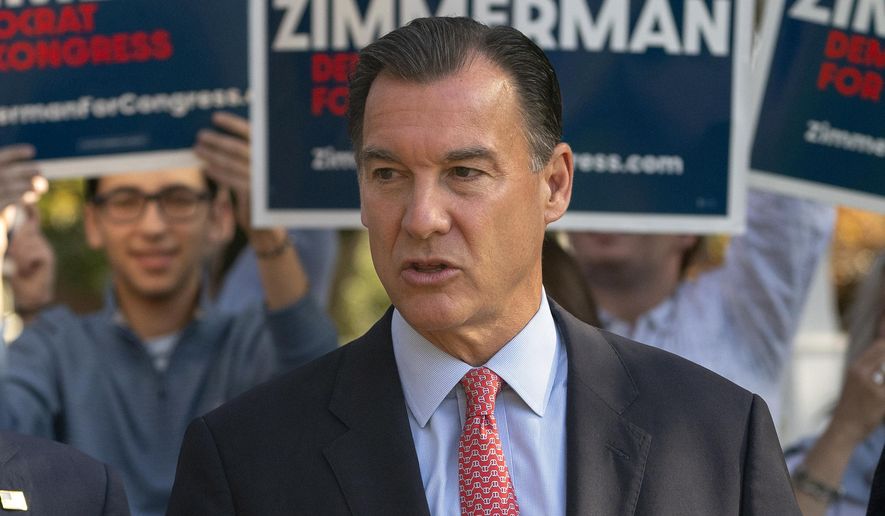 Then-Rep. Tom Suozzi, D-N.Y., right, speaks during a news conference with a bipartisan group of current or former elected officials who support Robert Zimmerman&#x27;s campaign, Nov. 7, 2022, in Great Neck, N.Y. Former U.S. Rep. Tom Suozzi will be the Democratic nominee in next year&#x27;s special election to replace ousted congressman George Santos, New York Democrats announced Thursday, Dec. 7, 2023. (AP Photo/John Minchillo, File)