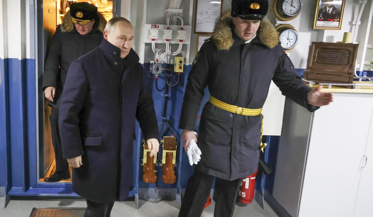 NextImg:Vladimir Putin visits a shipyard to oversee the commissioning of new Russian nuclear submarines