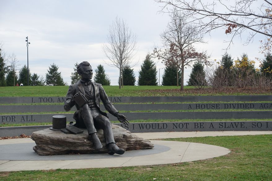 A statue of President Abraham Lincoln in Louisville, Kentucky, is missing a bronze top hat after it was pried off of a stone base recently. (File Photo credit: Mariusz Lopusiewicz via Shutterstock)