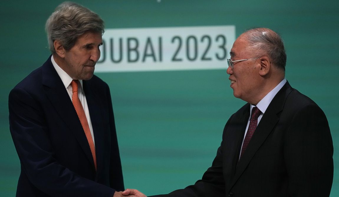 John Kerry, U.S. Special Presidential Envoy for Climate, left, and Xie Zhenhua, China special envoy for climate, meet for a news conference at the COP28 U.N. Climate Summit, Wednesday, Dec. 13, 2023, in Dubai, United Arab Emirates. (AP Photo/Rafiq Maqbool)