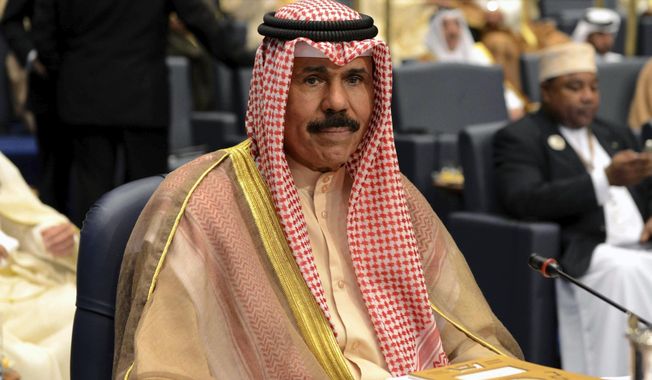 Kuwait&#x27;s then-Crown Prince Sheik Nawaf Al-Ahmad Al-Jaber Al-Sabah attends the closing session of the 25th Arab Summit in Bayan Palace in Kuwait City, Wednesday, March 26, 2014. Kuwait&#x27;s ruling emir, the 86-year-old Sheikh Nawaf Al Ahmad Al Sabah, has died, state television reported Saturday, Dec. 16, 2023. (AP Photo/Nasser Waggi, File)