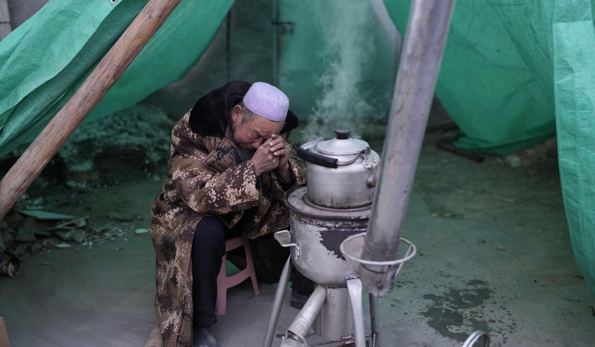 NextImg:China’s earthquake survivors endure frigid temperatures and mourn the dead