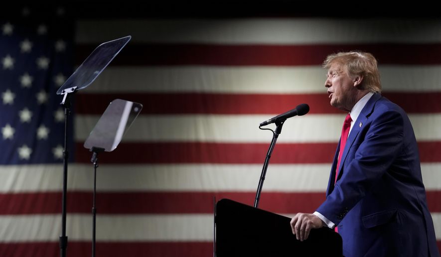 Former President Donald Trump speaks during a rally on Sunday, Dec. 17, 2023, in Reno, Nev. The Colorado Supreme Court on Tuesday, Dec. 19, declared Trump ineligible for the White House under the U.S. Constitution’s insurrection clause and removed him from the state’s presidential primary ballot, setting up a likely showdown in the nation’s highest court to decide whether the front-runner for the GOP nomination can remain in the race. (AP Photo/Godofredo A. Vásquez) **FILE**