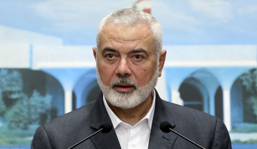 In this photo released by the Lebanese government, Ismail Haniyeh, the leader of the Palestinian militant group Hamas, speaks during a press conference after meeting with Lebanese President Michel Aoun, at the presidential palace, in Baabda, east of Beirut, Lebanon, Monday, June 28, 2021. Hamas said Wednesday, Dec. 20. 2023, its top leader, Ismail Haniyeh, has arrived in Cairo for talks on the war in Gaza. (Dalati Nohra/Lebanese Official Government via AP, File)