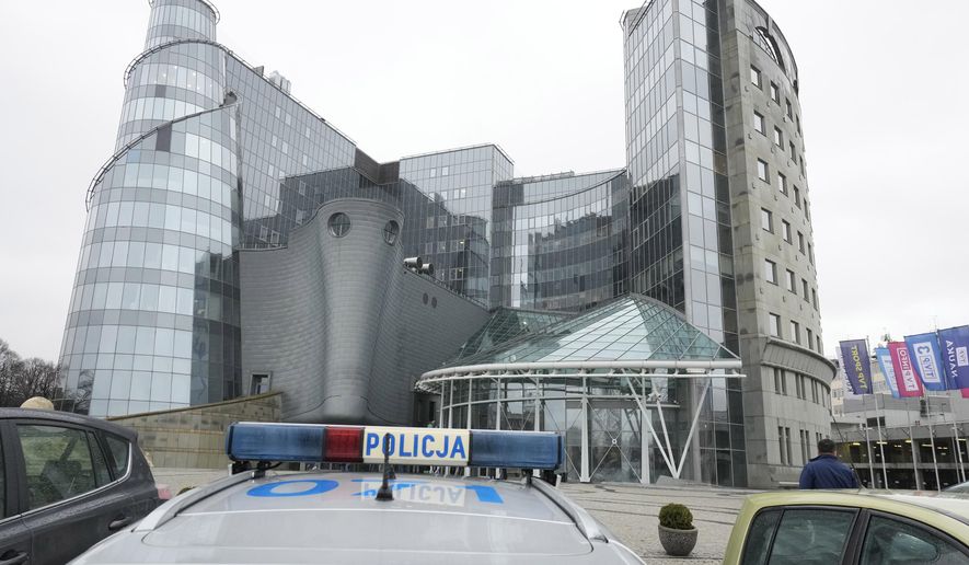 Police arrives at the headquarters of Poland&#x27;s state-owned TVP broadcaster to observe protests against the steps taken by the new pro-European Union government which is moving to free the media from the previous team&#x27;s political control and restore their objectivity and fairness, in Warsaw, Poland, Wednesday Dec. 20, 2023. (AP Photo/Czarek Sokolowski)