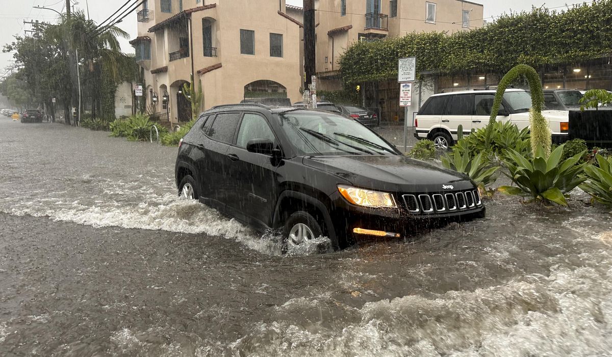 NextImg:Pacific storm dumps heavy rains, causes flooding in California coastal cities