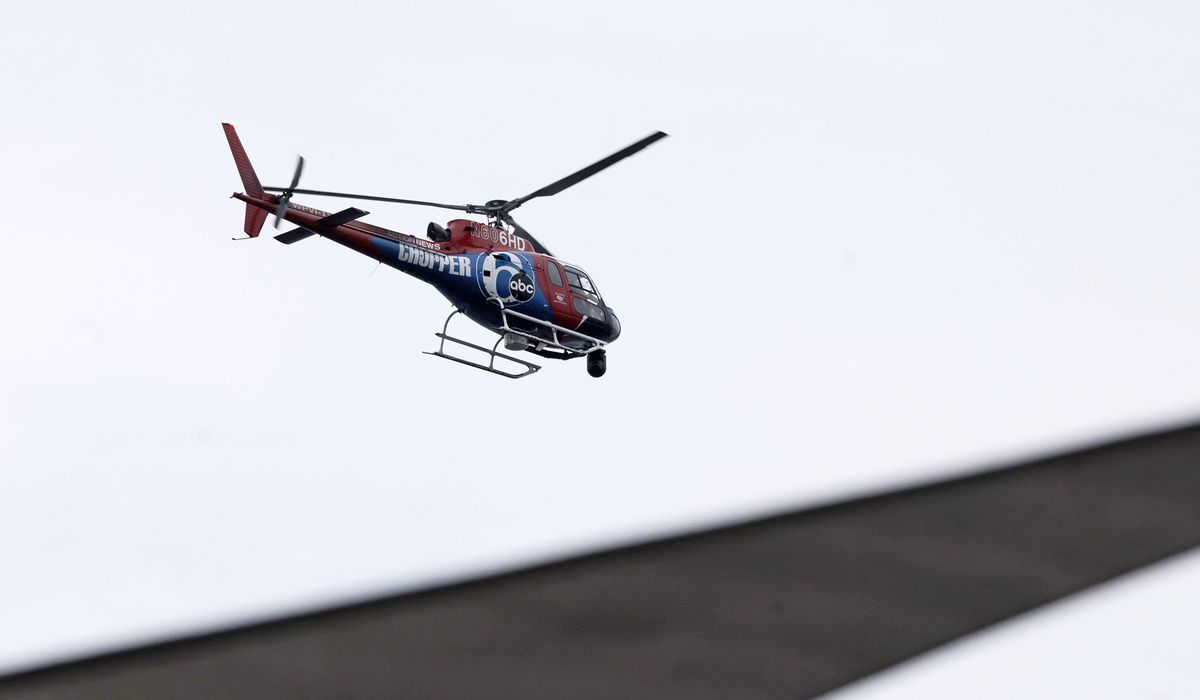 NextImg:Doomed Philadelphia news helicopter hit trees fast, broke up, then burned, killing 2 on board