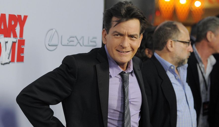 Charlie Sheen, a cast member in &quot;Scary Movie V,&quot; poses at the premiere of the film on April 11, 2013, in Los Angeles. Sheen’s neighbor was arrested after being accused of assaulting the actor in a Malibu home this week, authorities said. Electra Schrock was arrested for assault with a deadly weapon, the Los Angeles Sheriff’s Department said in a statement Friday, Sec. 22, 2023. (Photo by Chris Pizzello/Invision/AP, File)