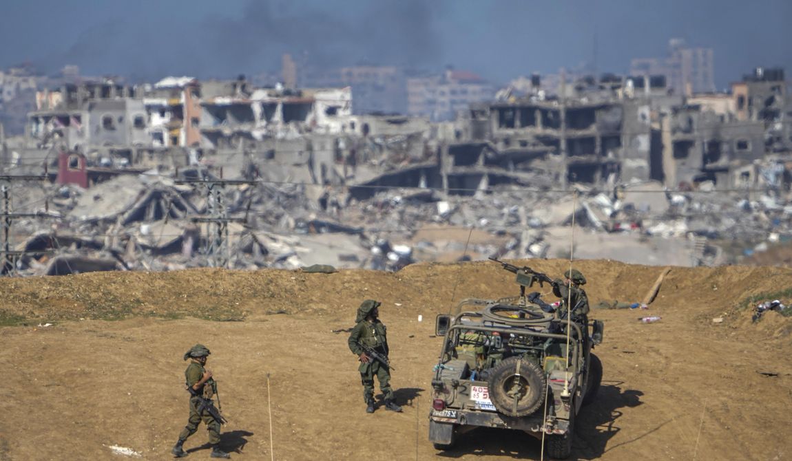 Israeli army troops are seen near the Gaza Strip border, in southern Israel, Sunday, Dec. 24, 2023. The army is battling Palestinian militants across Gaza in the war ignited by Hamas&#x27; Oct. 7 attack into Israel. (AP Photo/Ariel Schalit)