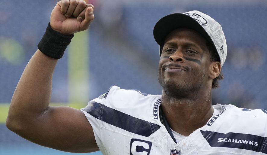 Seattle Seahawks quarterback Geno Smith celebrates after the Seahawks defeated the Tennessee Titans in an NFL football game on Sunday, Dec. 24, 2023, in Nashville, Tenn. (AP Photo/George Walker IV)